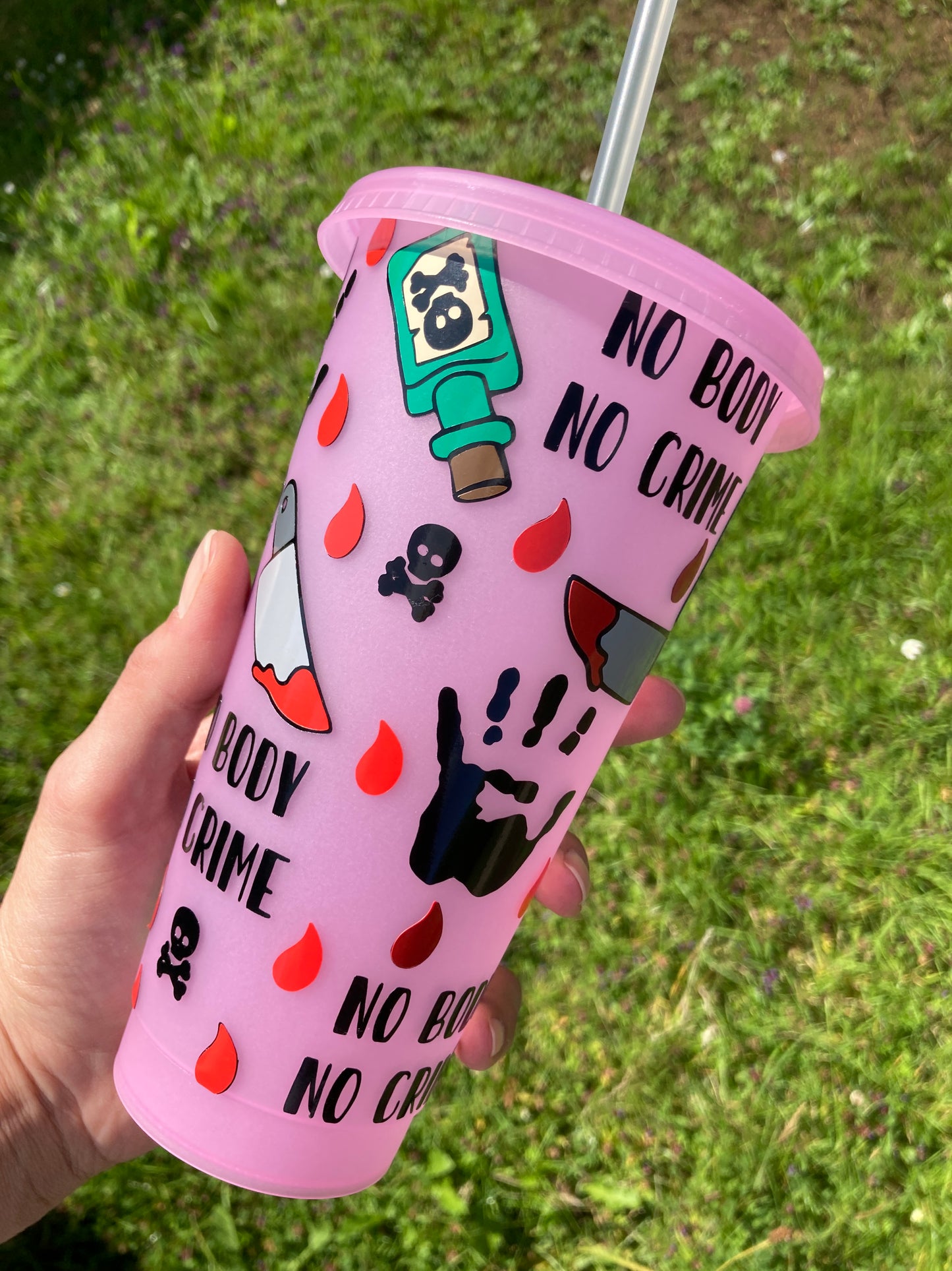 Glow in the dark pink cup with No Body No Crime design