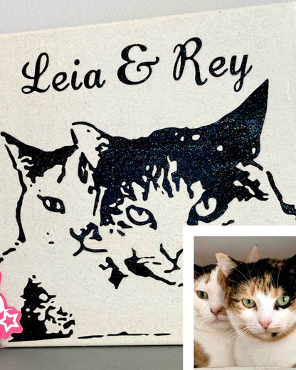 Canvas print with black cat silhouette and 'Leia & Rey' text, alongside a photo of two cats.